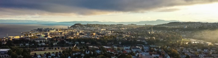 Dramatic skies over Trondheim Norway herald the arrival of autumn