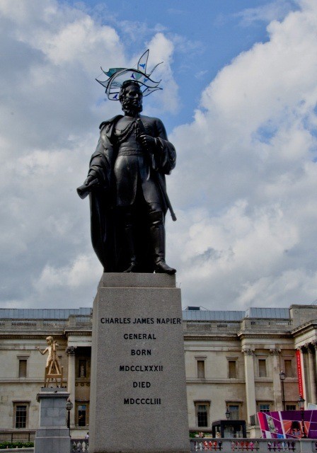 You are currently viewing Grown-up Travel Guide Daily Photo: Trafalgar Square statue with designer hat, London, England