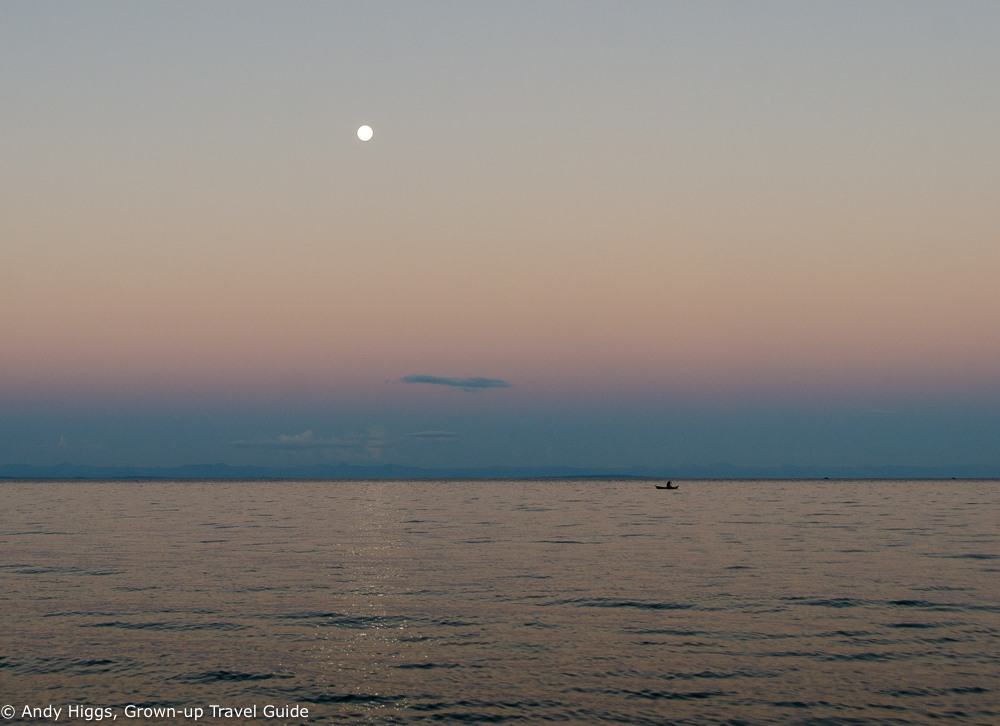 Moon over fishing boat